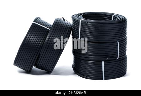 Coils of black cable isolated on white background Stock Photo