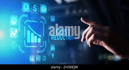 Cost reduction business finance concept on virtual screen. Stock Photo