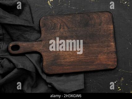 Empty cutting board on a wooden table Stock Photo