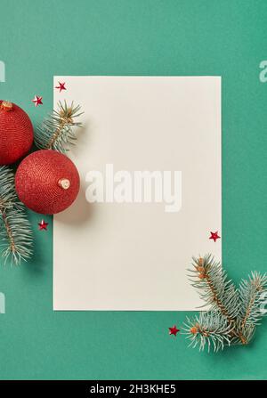 Christmas balls and blank paper Stock Photo