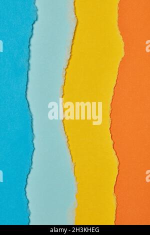 Multi-colored torn paper background Stock Photo
