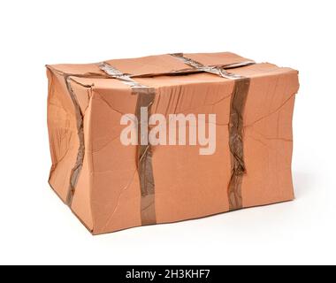 Damaged cardboard box on white background Stock Photo
