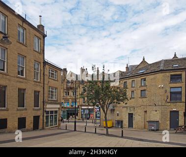 Old buildings and shops in oastler square in bradford west yorkshire Stock Photo