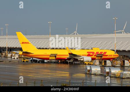 Boeing 767 cargo aircraft being unloaded at East Midlands Airport in the UK. Stock Photo