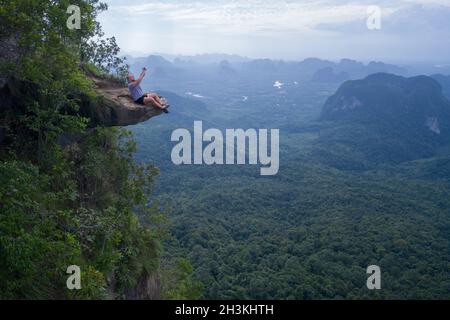 Aerial view of man drone operator on the mountain view point Stock Photo