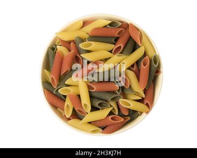 Tri-color penne pasta. Tomato, spinach and wheat pastas. Top view. Stock Photo