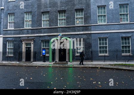 LONDON, UK. 29 Oct, 2021. The door of 10 Downing street is decorated with green LED energy saving lights and a globe  ahead of the COP26 summit in Glasgow on Sunday.  The 2021 United Nations Climate Change Conference, also known as COP26, is the 26th United Nations Climate Change conference will bring leaders from over 150 counties  together to accelerate action towards the goals of the Paris Agreement and  held between 31 October and 12 November 2021, under the co-presidency of the United Kingdom and Italy to tackle global warming and climate crisis. Credit: amer ghazzal/Alamy Live News Stock Photo