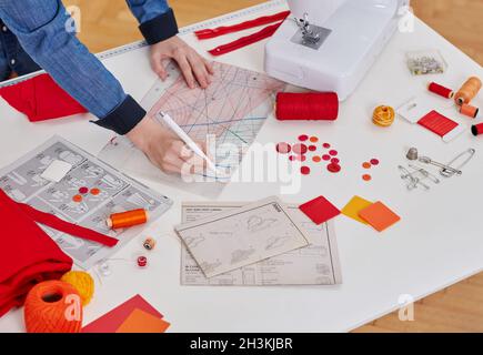 Young seamstress woman in her workshop Stock Photo