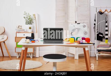 Seamstress woman in workshop Stock Photo