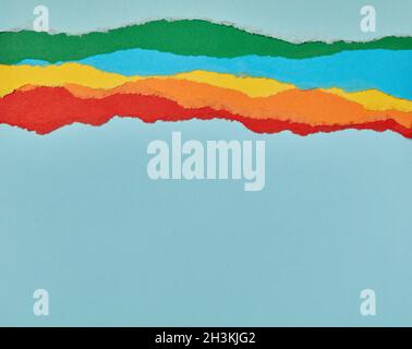 Multi-colored torn paper background Stock Photo