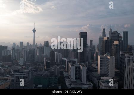 Aerial view of Kuala Lumpur city skyline during cloudy day Stock Photo
