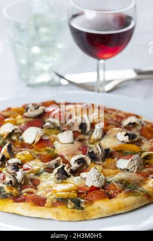 Mushroom pizza on a white plate Stock Photo