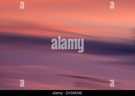 Abstract cloud textures and colors at sunset Stock Photo