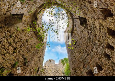 Upward view inside the ruins of the Puilaurens medieval Cathare castle in Aude, France Stock Photo