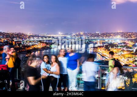 ISTANBUL, TURKEY - AUGUST 24, 2018: Peoples watching view of Golden Horn from Pierre Loti Hill. Eyup, Istanbul, Turkey. Stock Photo