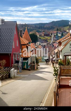 Empty paved street going down in the old town Stock Photo