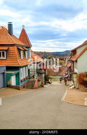 Empty paved street going down in the old town Stock Photo