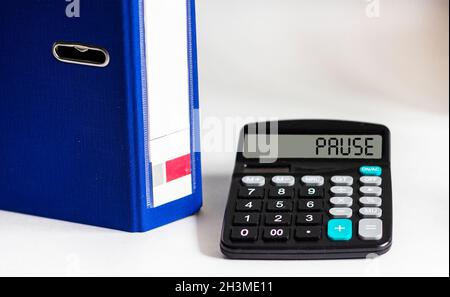 Calculator with PAUSE on display isolated on white background Stock ...