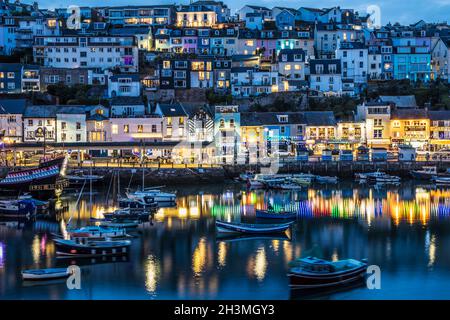 Brixham town and harbour at twilight. Stock Photo