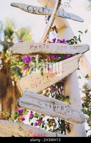 Signs indicating directions made by hand with wood Stock Photo