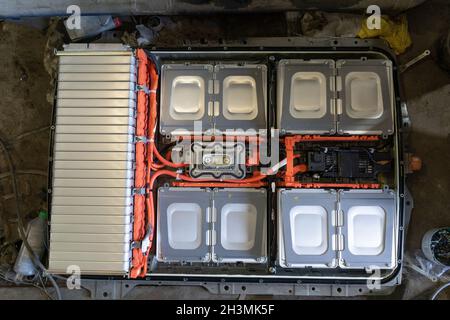 Cell high voltage batteries from an electric car, zero emition vehicle Nissan Leaf. Disassembled battery. Service station, servi Stock Photo