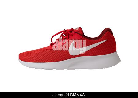 Red sneakers of Nike brand. Shoes with laces for jogging and fitness. Stylish youth model. Object cut out on white background. Side view. May 2019 Stock Photo Alamy