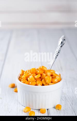 Boiled corn kernels in white cups Stock Photo