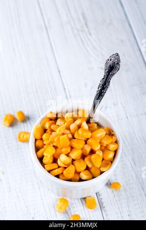 Boiled corn kernels in white cups Stock Photo