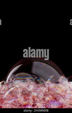 Soap foam on black background Stock Photo