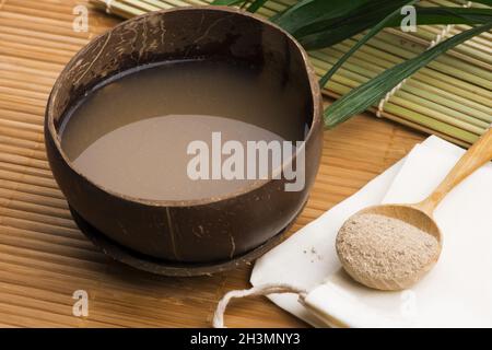 Kava drink made from the roots of the kava plant mixed with water Stock Photo