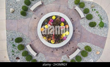 Aerial down of landscaping and walkways surrounding garden Stock Photo