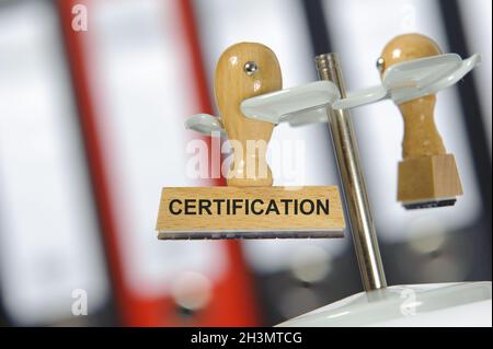 Certification printed on rubber stamp Stock Photo