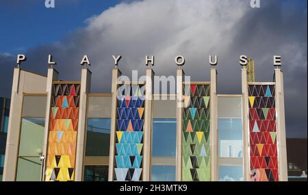 The brightly coloured facade of the new west yorkshire playhouse theatre building against a bright cloudy blue sk Stock Photo