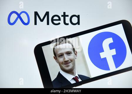 This illustration photo taken in New Delhi on October 29, 2021, shows  a smartphone in front of a computer screen showing the META logo. Facebook chief Mark Zuckerberg on Thursday announced the parent company's name is being changed to 'Meta' to represent a future beyond just its troubled social network. The new handle comes as the social media giant tries to fend off one its worst crises yet and pivot to its ambitions for the 'metaverse' virtual reality version of the internet that the tech giant sees as the future. Stock Photo