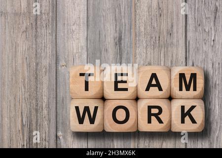 Team work printed on wooden cubes Stock Photo