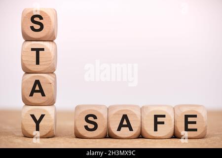 Stay safe written on wooden cubes Stock Photo