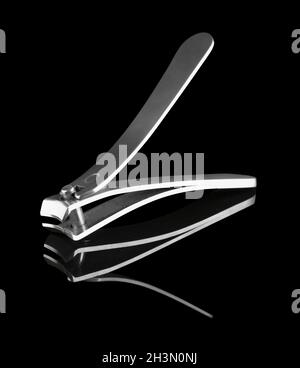 Nail clippers, clippers, manicure hand tools, on black background isolated with reflection Stock Photo