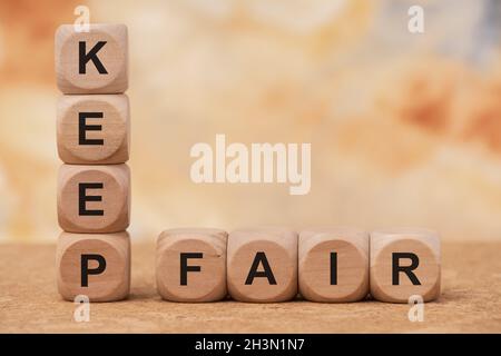 Keep fair printed on wooden cubes Stock Photo