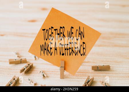 Conceptual caption Together We Can Make A Difference. Word Written on be very important some way in like team or group Piece Of Blank Square Note Stock Photo