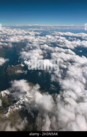 Mountain range under clouds, aerial survey. Caucasus, Krasnodar Territory, Russia