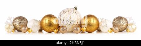 Christmas border of white and gold ornaments. Side view isolated on a white background. Stock Photo