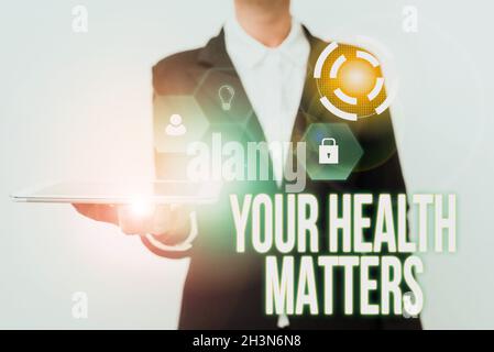 Handwriting text Your Health Matters. Business idea good health is most important among other things Woman In Uniform Displaying Mobile Device Stock Photo