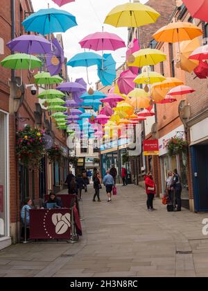 Grand display of hanging umbrellas  in the umbrella street in Bishops Shopping Centre  County Durham England UK Stock Photo