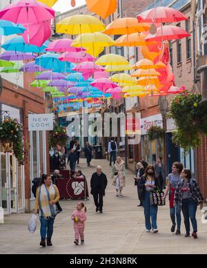 Grand display of hanging umbrellas  in the umbrella street in Bishops Shopping Centre  County Durham England UK Stock Photo