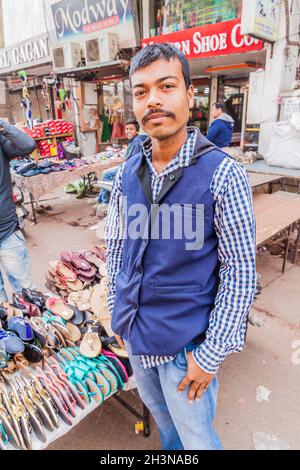 LUCKNOW, INDIA - FEBRUARY 3, 2017: Local shoe vendor in Lucknow, Uttar Pradesh state, India Stock Photo