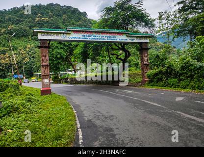 city entry gate with leading tarmac road at morning from flat angle image is taken at darjeeling west bengal india on Sep 18 2021. Stock Photo