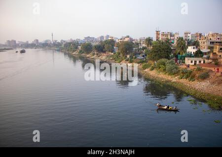 Picture of Dhaka city on the banks of river Buriganga.The river Buriganga has enhanced the beauty of the capital city Dhaka. Stock Photo