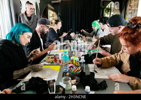 CAPE TOWN, SOUTH AFRICA - Apr 21, 2021: A group of young people at a team-building workshop in an art class in Cape Town, South Africa Stock Photo
