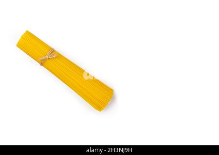 raw pasta spaghetti on white isolated background with clipping patch. World food day Stock Photo