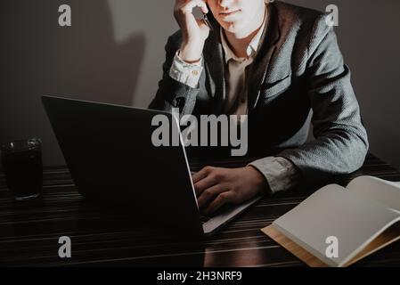 Business man working at office with laptop and documents on his desk, consultant lawyer concept Stock Photo